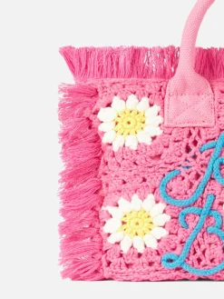 Colette-Handtasche mit gehäkelten Blumenaufnähern