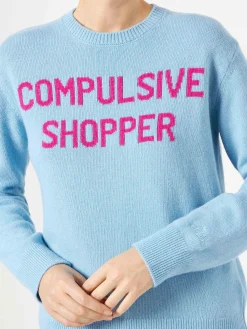 Hellblauer Damenpullover mit Rundhalsausschnitt und Compulsive Shopper-Aufdruck