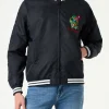Herrenblaue Marinejacke mit aufgestickten Papageien
