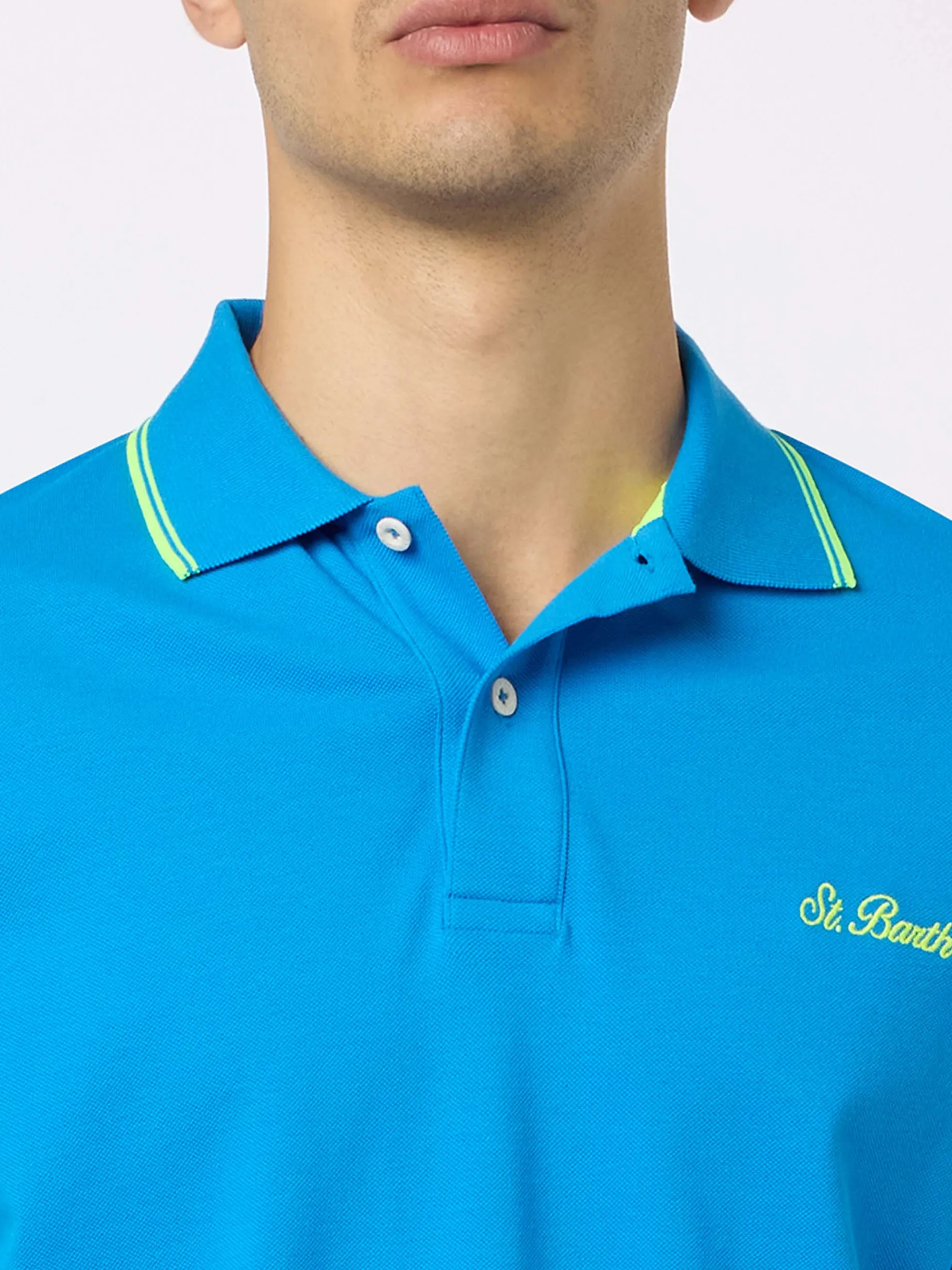 Herren-Poloshirt Beverly Hills aus blauem Baumwoll-Piqué mit Palmenstickerei