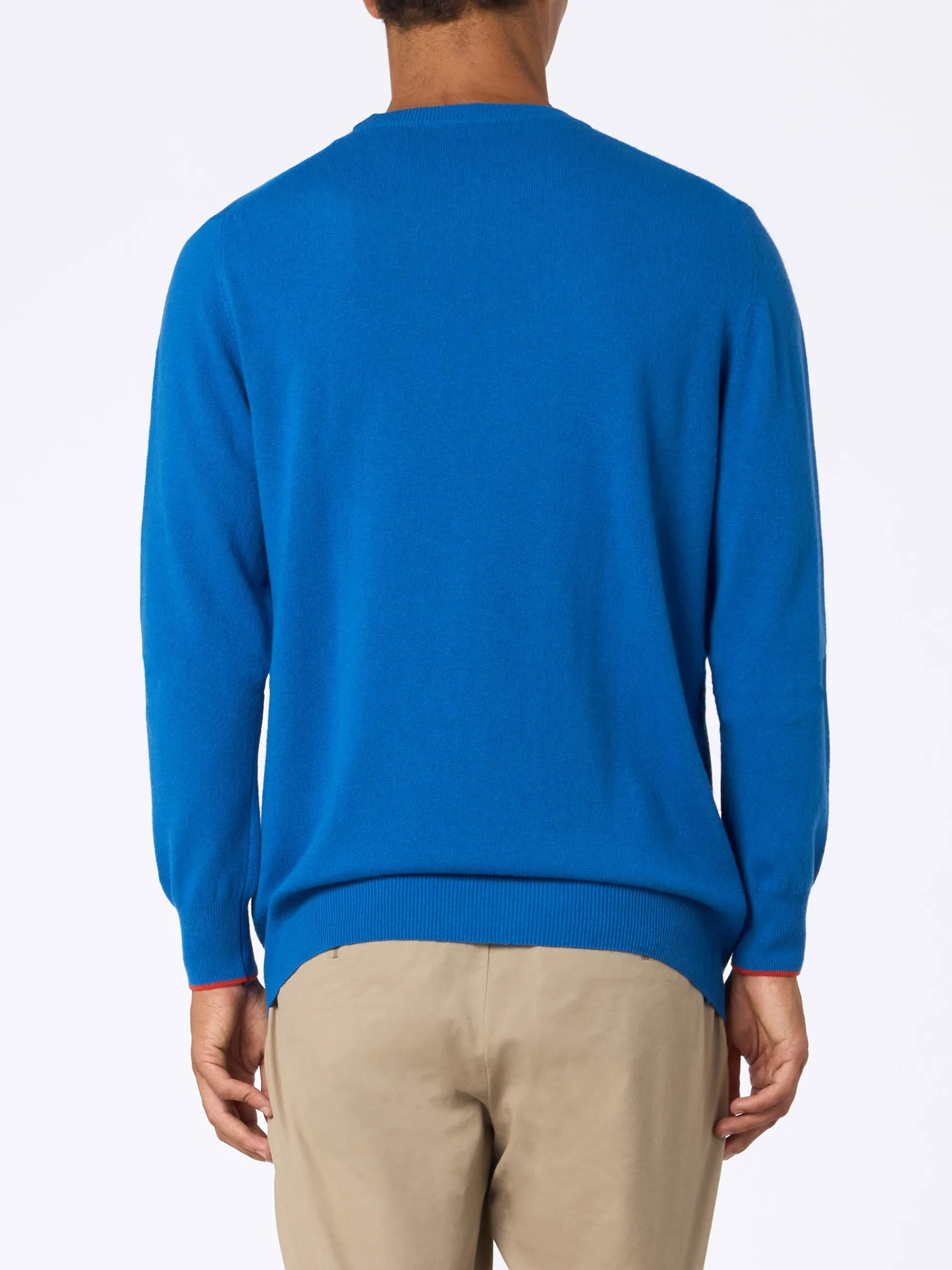 Herren-Skipullover Heron in Blau mit Stickerei „Ho sempre sbagliato tutto“.