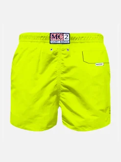 Jungen-Badeshorts aus hellem, fluogelbem Stoff | Pantone® Sonderausgabe