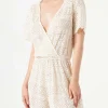 Kurzer Jumpsuit aus cremefarbener Spitze