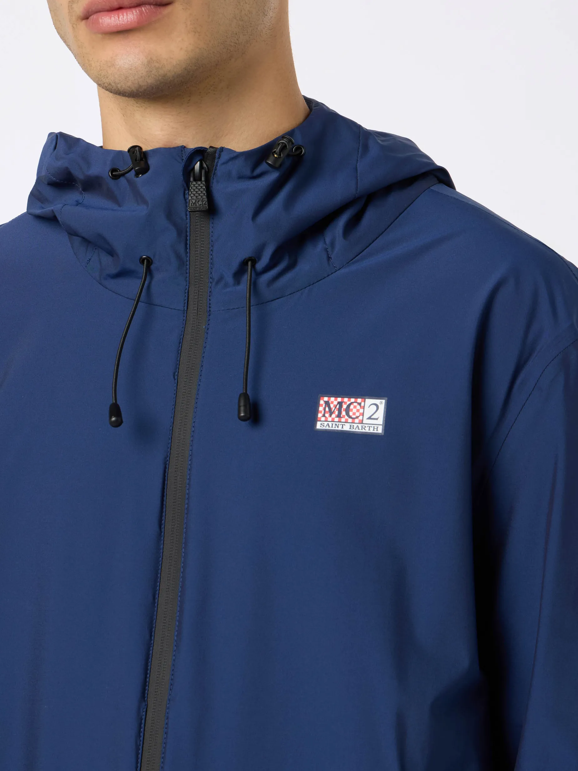 Leichte Windjacke aus marineblauem Stoff mit Kapuze für Herren Sloop