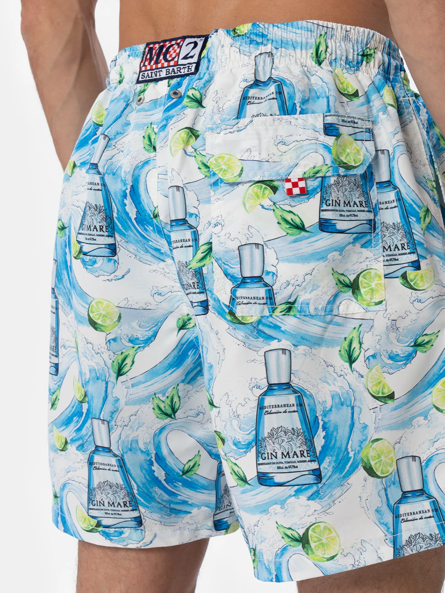 Mittellange gestreifte Gustavia-Badeshorts für Herren mit Gin-Print | GIN MARE SONDEREDITION