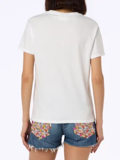 Rosafarbenes Rundhals-T-Shirt Emilie aus Baumwolljersey für Damen mit Snoopy St. Barth Padel Club-Stickerei | SNOOPY PEANUTS SPECIAL EDITION