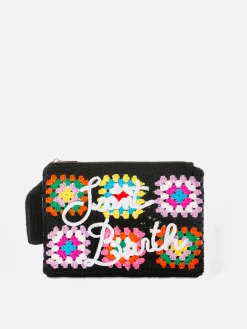 Schwarze Parisienne-Häkelclutch mit Saint-Barth-Stickerei