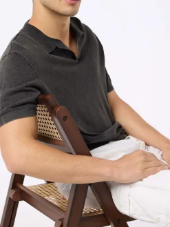 Schwarzes Herren-Strickpoloshirt Sloan mit Vintage-Behandlungseffekt